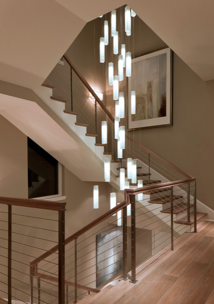 Luxury Staircase Chandeliers Lighting Up The Home